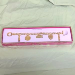 NIB Estee Lauder Gold Icon Charm Bracelet